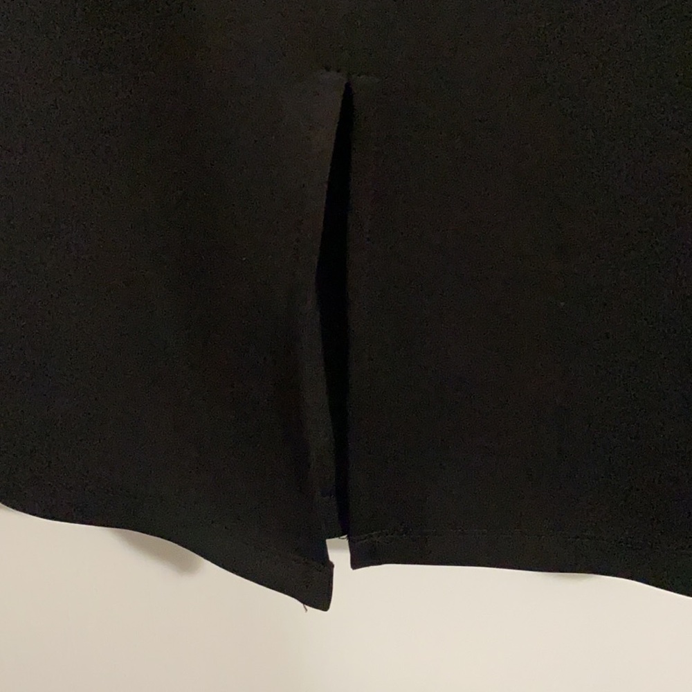 NWOT. Bebe black midi length skirt. Never worn. - Picture 6 of 6